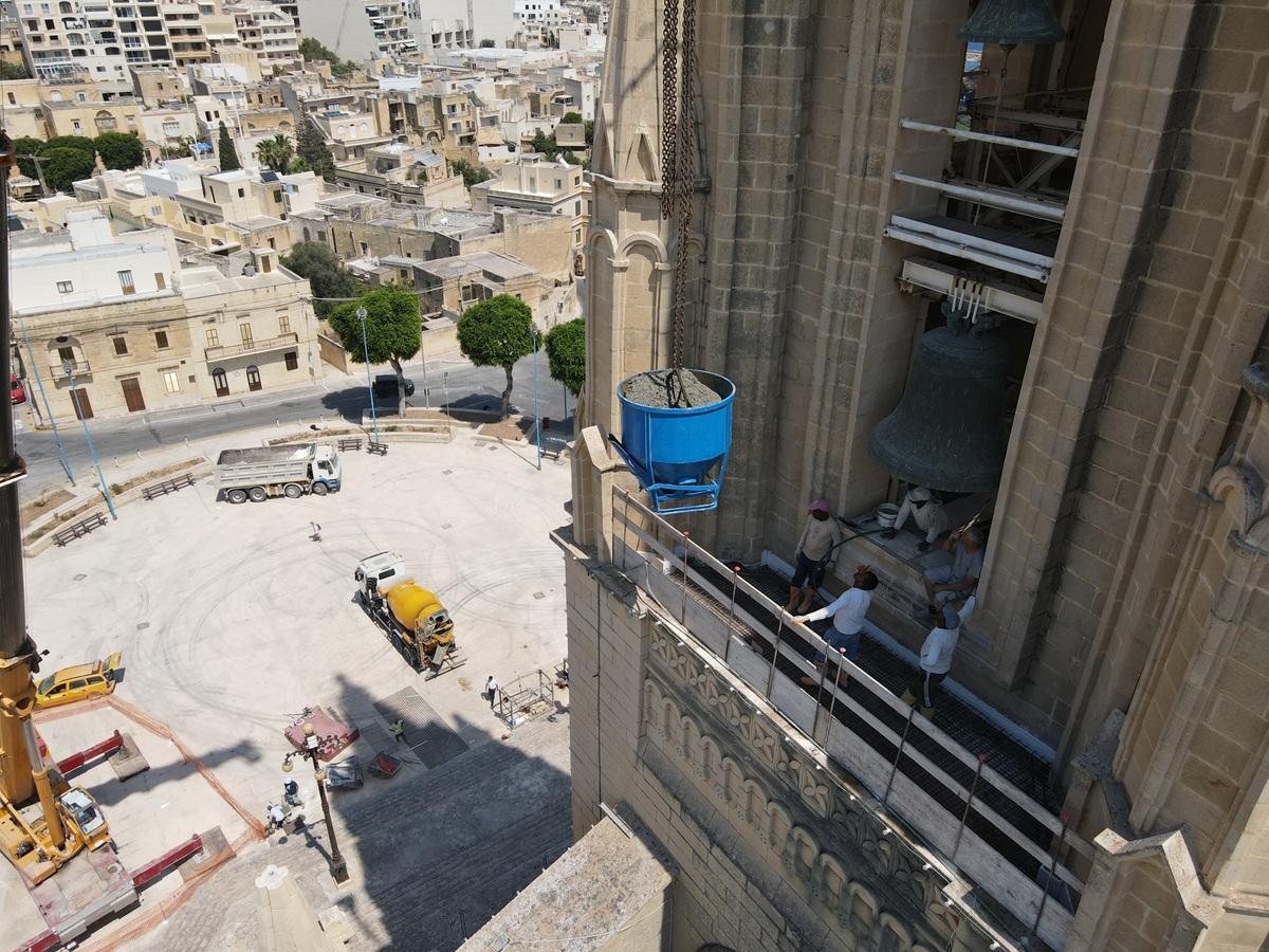 Works have begun on a scaffold that is meant to catch any falling stones.