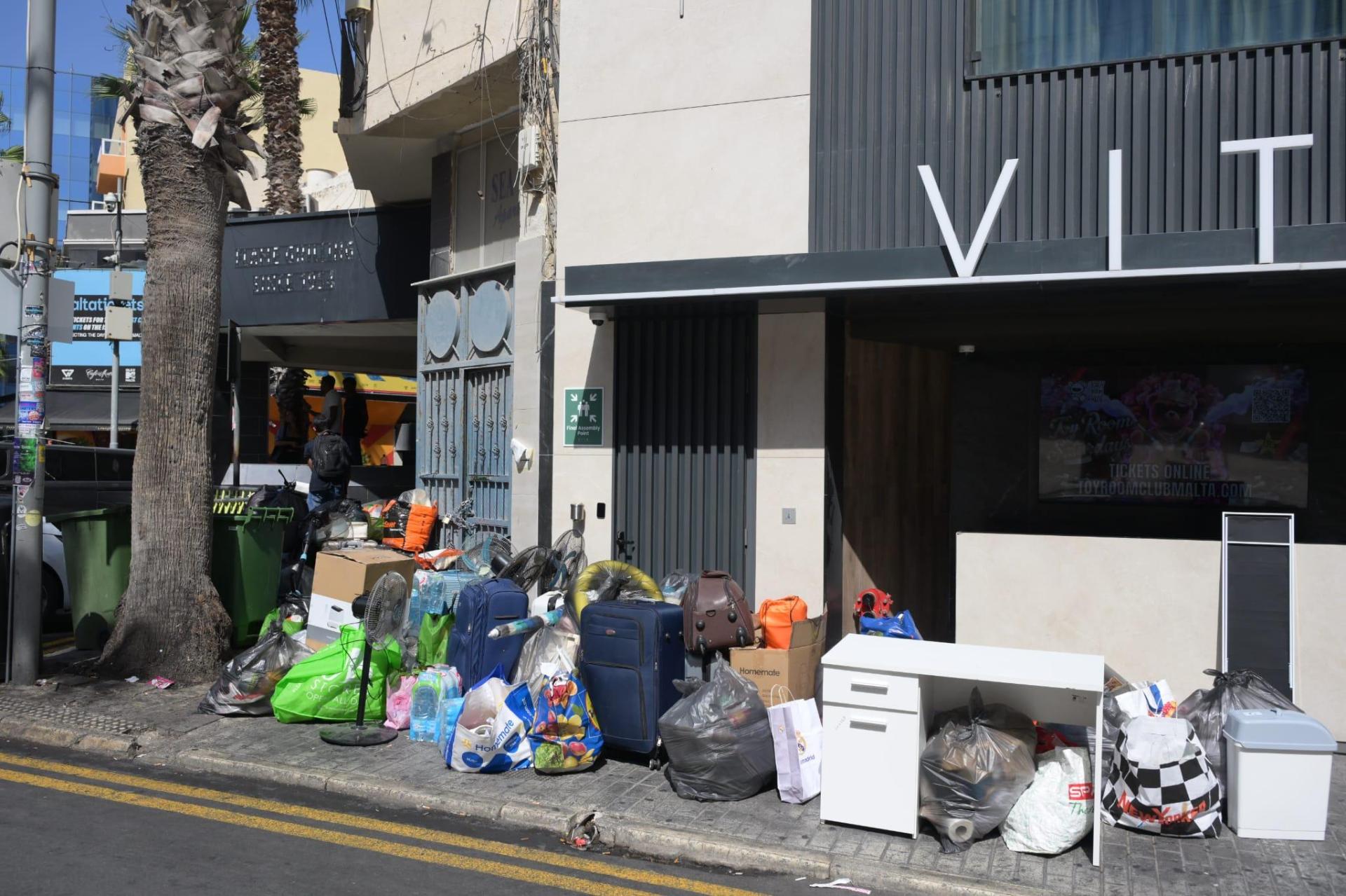 Bags and other items outside the evacuated apartment block (Matthew Mirabelli)