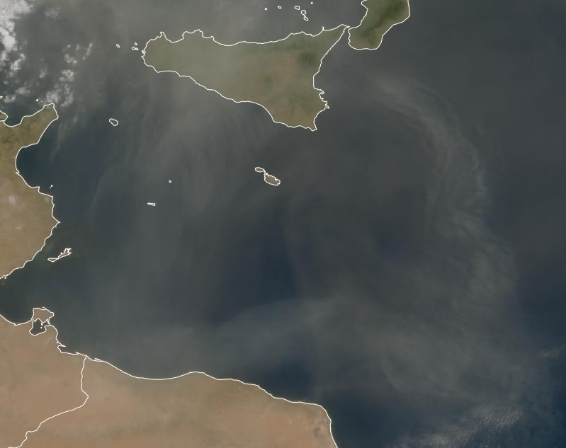 The dust cloud covering the islands and surrounding area. Photo: Malta International Airport