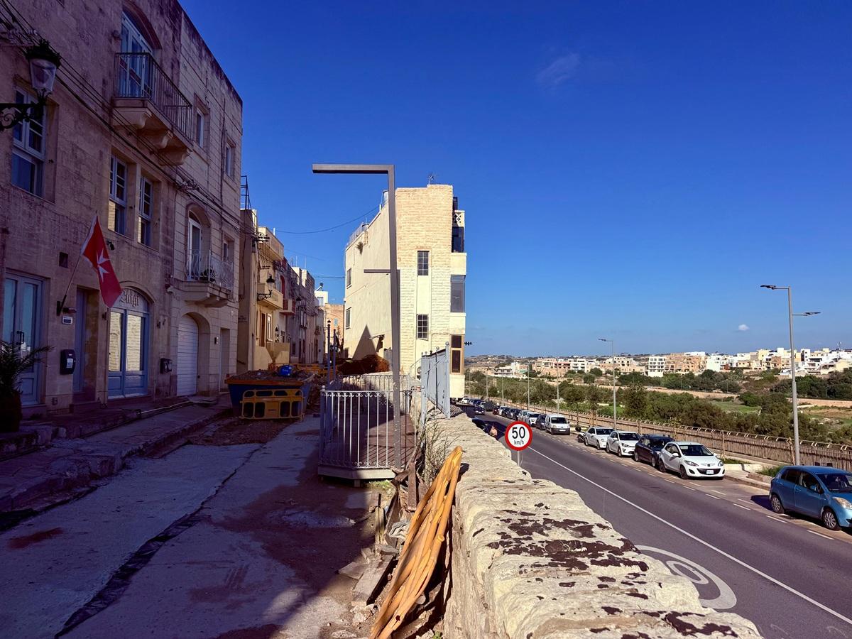 Ġilormu Dingli Street (left) runs parallel to Għeriexem Road and belvedere.