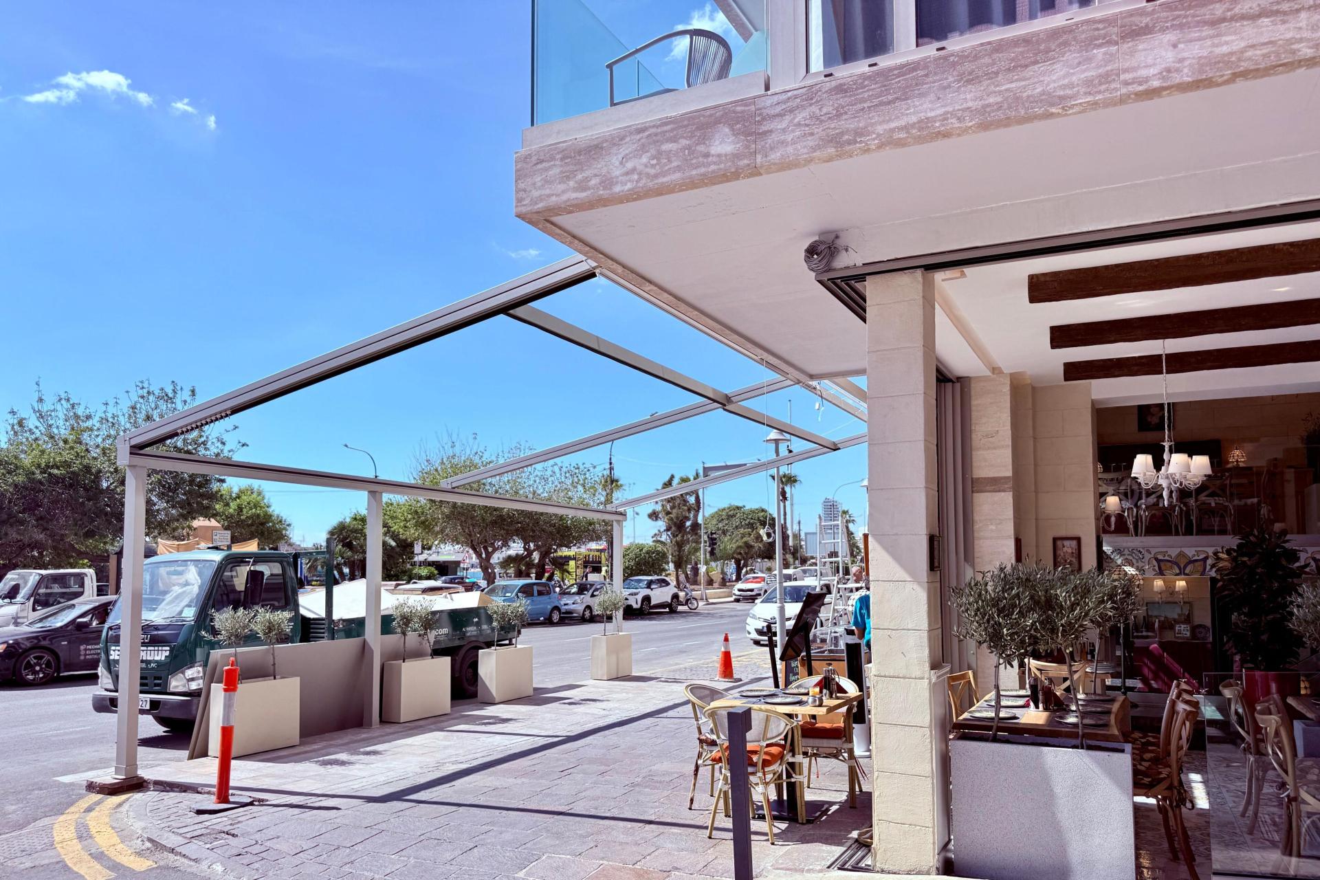 The outside catering extension in front of the Centric hotel occuplies public land on a dangerous corner and covers the lay-by too.