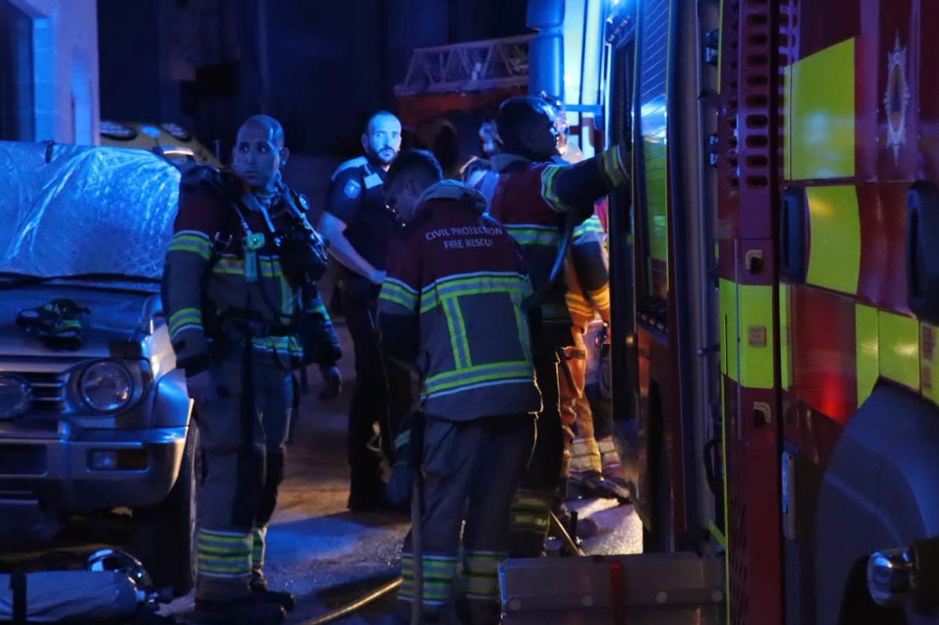 Firefighters at the scene of the fire in Qala. (CPD)